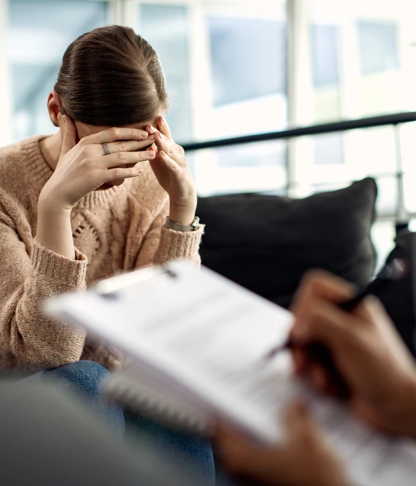 depressed-woman-having-psychotherapy-session-doctor-s-office-page