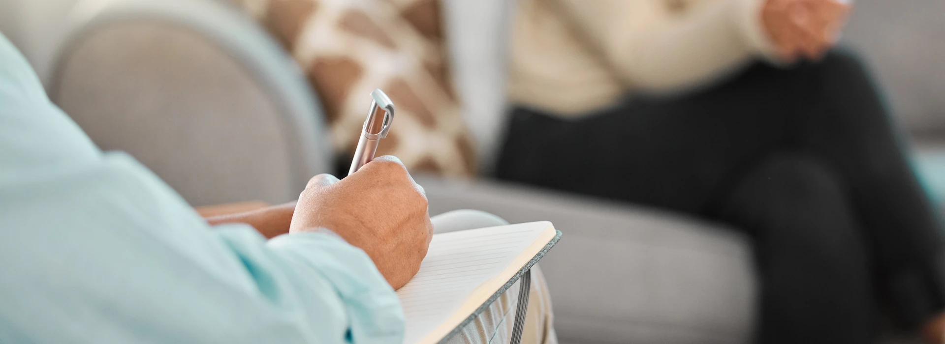 sofa-person-therapist-with-notebook-consultation-writing-notes-banner