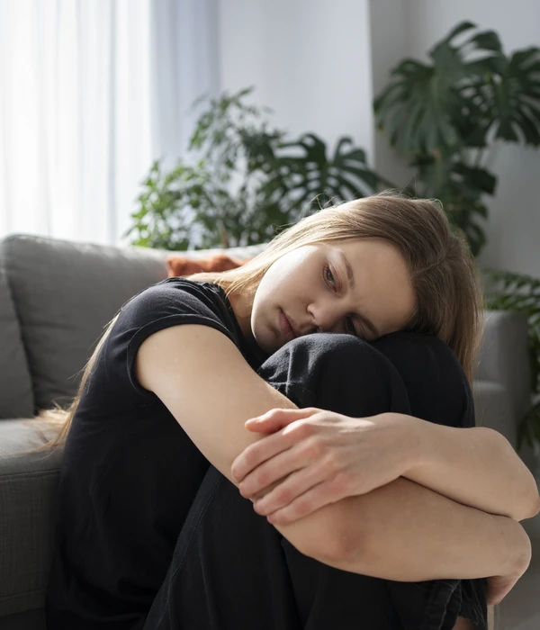 sad-young-woman-home-page